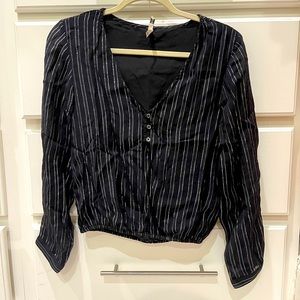 Black and silver striped top